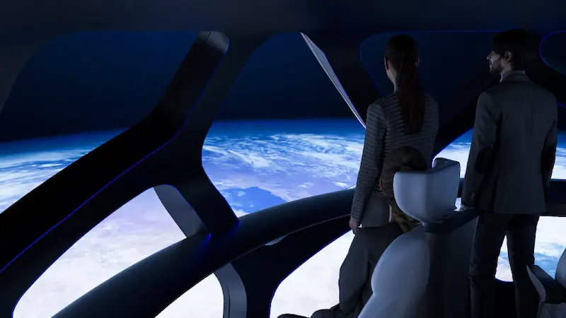 EOS-X SPACEの気球型宇宙カプセル内から、乗客が大きな窓越しに青い地球を眺めているCGイメージ