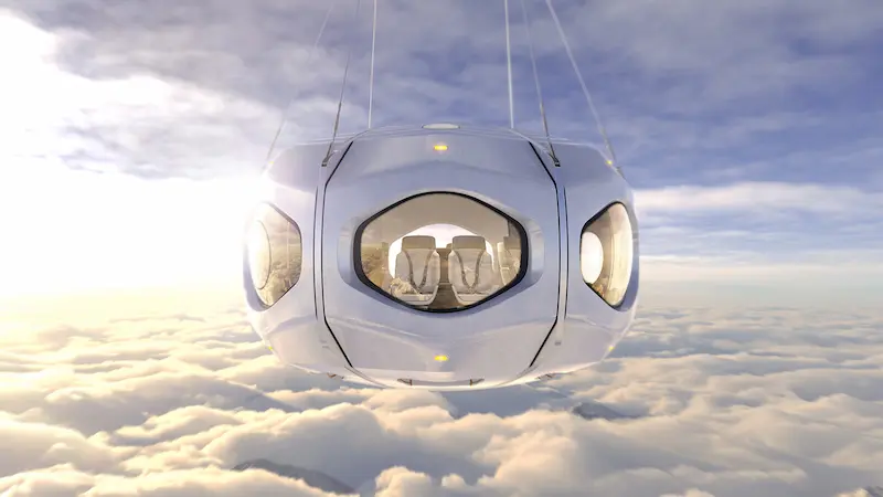 World Viewの成層圏気球カプセルが雲の上を上昇する様子を描いたレンダリング